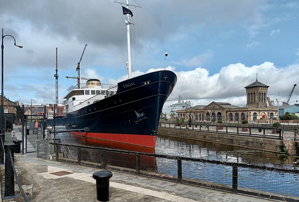 A ship moored at a city quay